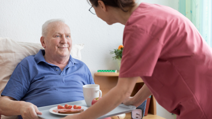 elderly man eating
