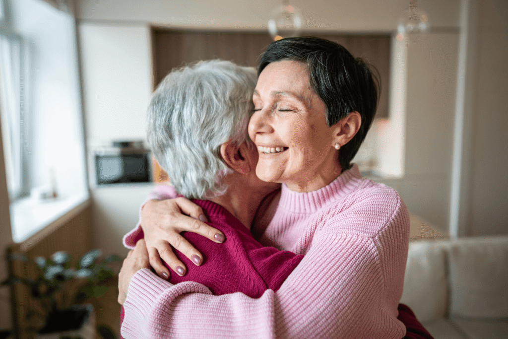 Joyful serene happy woman lovingly embraces husband, celebrating reunion after separation. Holiday greetings, strong family bonds, trust and warmth in relationship, emotional connection and support